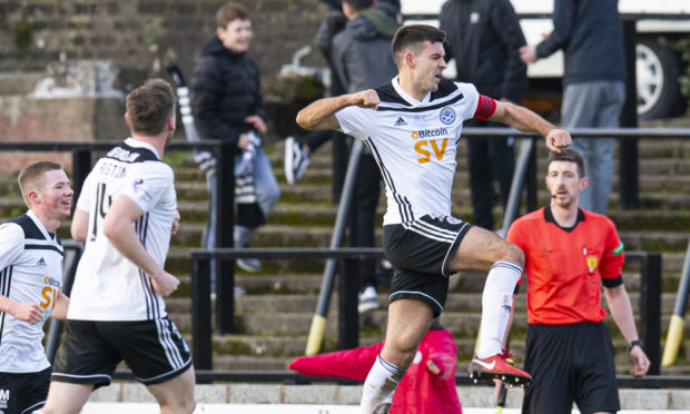 Steven Bell celebrates netting for Ayr.