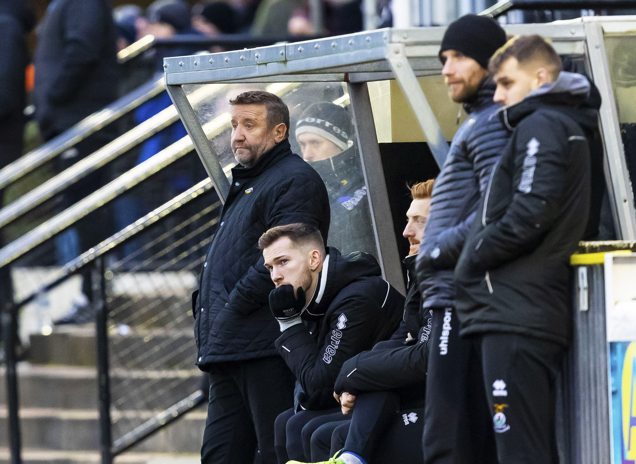 Jamie McCart (centre) next to manager John Robertson during Saturday's game with Ayr United.