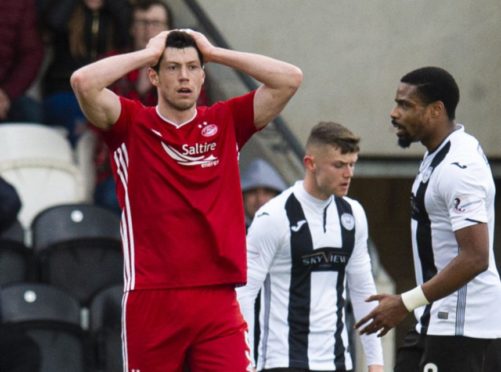 Aberdeen's Scott McKenna looks dejected as his shot is palmed out for a corner during the Ladbrokes Premiership match between St Mirren and Aberdeen