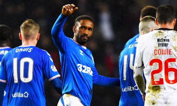 Jermain Defoe celebrates after netting for Rangers.