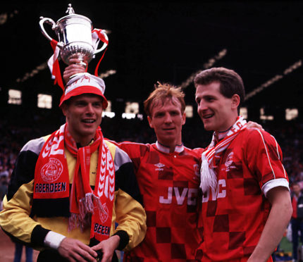 Aberdeen trio Theo Snelders, left, Alex McLeish, centre, and Brian Irvine celebrate the win in 1990.