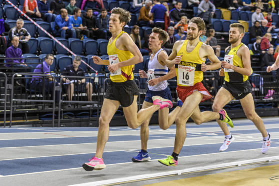 Stephen Mackay, left, runs in Glasgow.