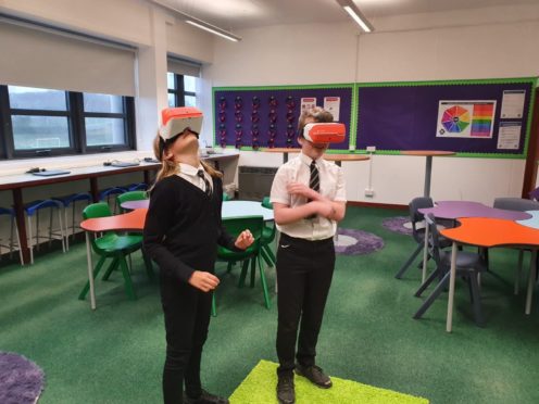 Pupils using the VR headsets.