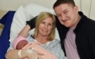 Lynda and Darren Cunningham with baby Isla James - born at 5.31am weighing at 7lb 8oz.
Picture by COLIN RENNIE