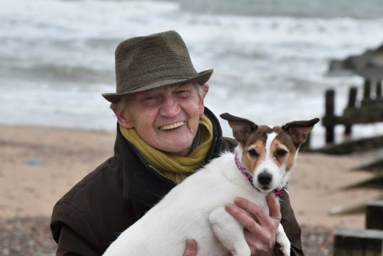 Joe McGunnigle with his Jack Russell (Misty) at Aberdeen Beach.