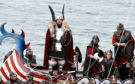 In the picture is Guizer Jarl, Liam Summers and his squad on the boat. 
Picture by Jim Irvine