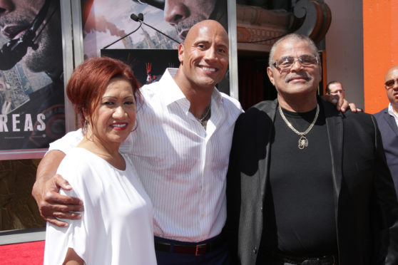 Mandatory Credit: Photo by Jim Smeal/BEI/Shutterstock (4779433aq)
Dwayne Johnson with Parents Ata Johnson and Rocky Johnson
Dwayne Johnson hand and footprint ceremony, Los Angeles, America - 19 May 2015