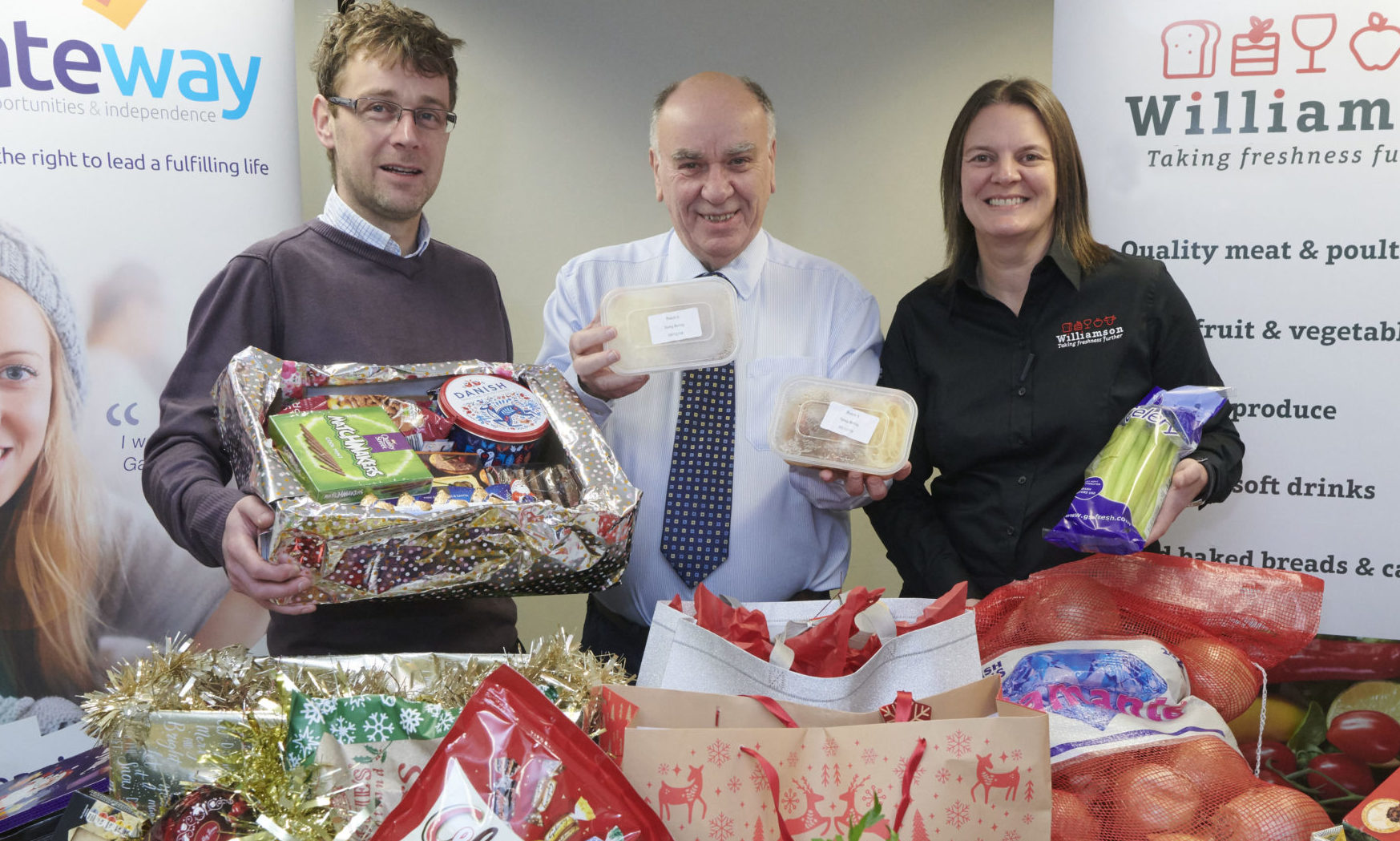 Overseeing the distribution network are Food For Families founder David Sutherland (centre) with Louise Beattie of Williamsons Food Service and Craig Riddle, finance manager of Gateway.