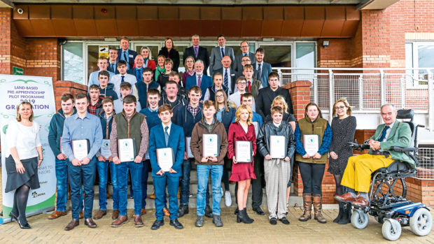Pilot scheme pre-apprenticeship students and their mentors at the graduation ceremony which was held in Perth.