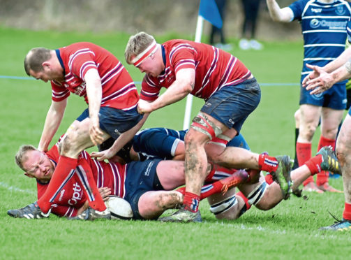 Aberdeen Grammar (red) in action against Musselburgh.