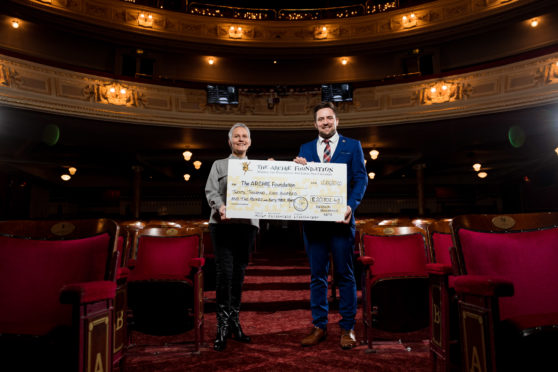 Cheque hand over, from Aberdeen Performing Arts to the Archie Foundation, with funds raised from 2019's pantomime. Pictured is Chief Executive, Jane Spiers and Jamie Smith from the ARCHIE Foundation at His Majesty's Theatre.