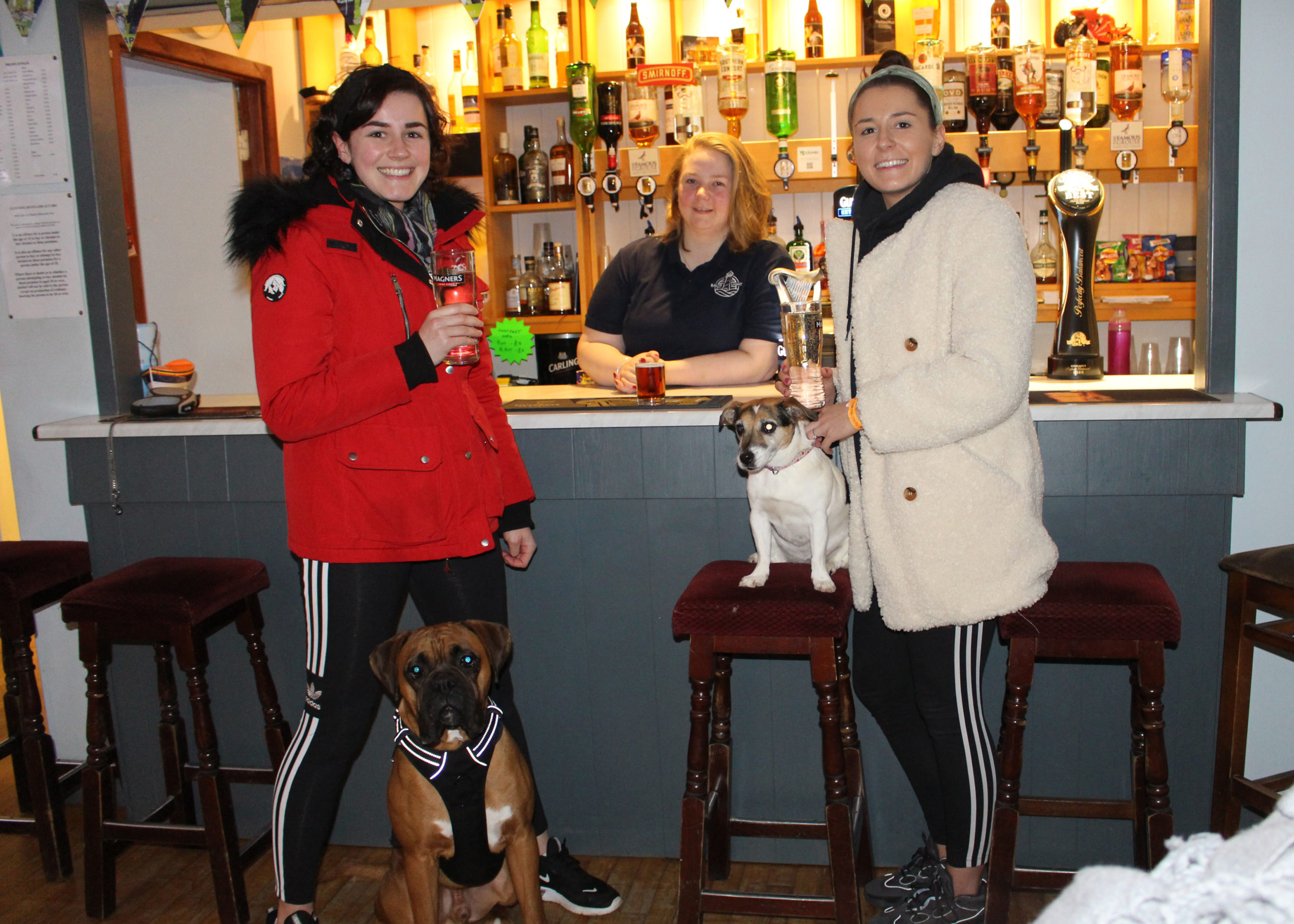 Karis and Megan Burns with barperson Yvonne Anderson at Balta Light Pub in Unst.