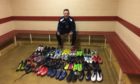 Christopher Adams with the football boots
