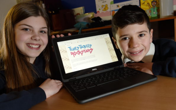 Pupils Katie Cameron and Lucca Williams, both of Primary 7 at work on their computers.

Picture by Sandy McCook.