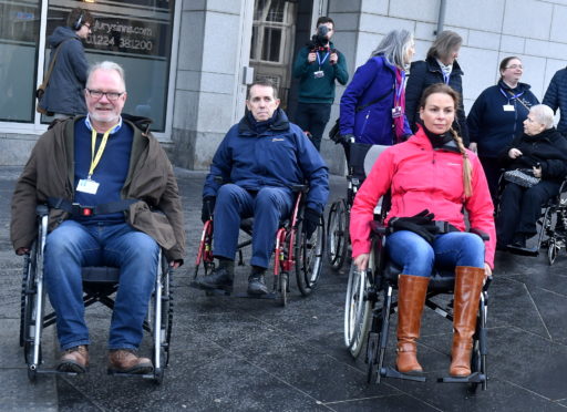 Councillors John Cooke, Steve Delaney and Claire Imrie crossing the street as part of Future Choices challenge.
Picture by Chris Sumner