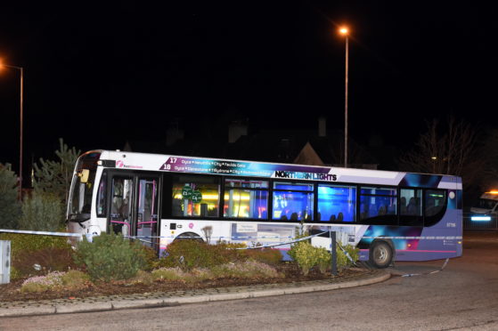 A bus has crashed and ended up on top of the four-mile roundabout in Bucksburn.
Picture by Kenny Elrick