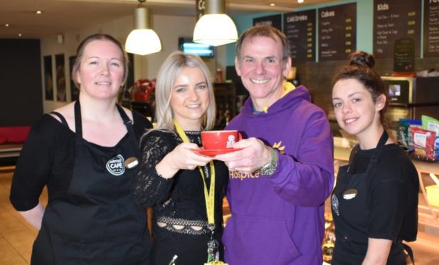 Dawn Cowie, Archie Foundation Fundraiser with Andrew Leaver, Highland Hospice Head of Fundraising and cafe staff members Eilish McGlinn and Caroline Black.