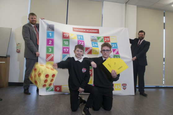 Lochside Academy Headteacher Colin Hendry with pupils Sean Paul Gordon and Kai McLaughlin and Councillor John Wheeler.