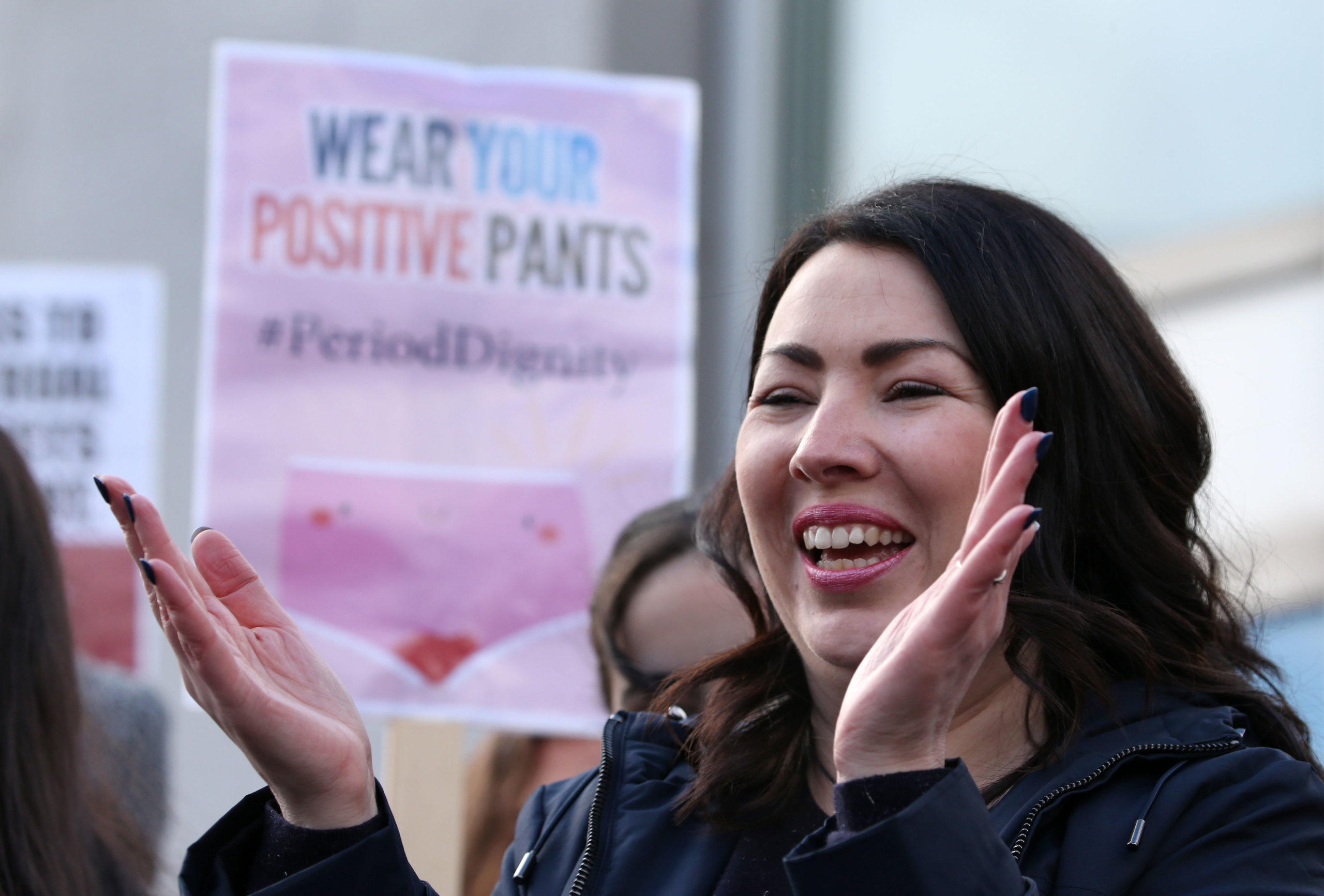 Monica Lennon MSP joins supporters of the Period Products bill at a rally outside Parliament in Edinburgh.