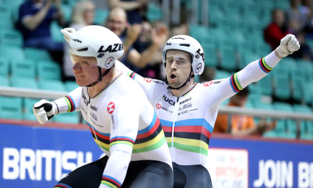 Great Britain's Neil Fachie (right) and his pilot Matt Rotherham (left) celebrate winning the Men's B 1000m Time Trial with a new world record.