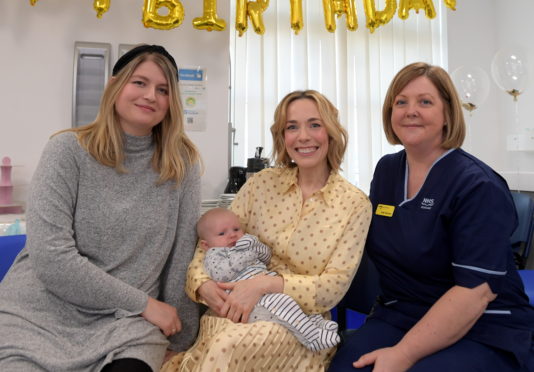 Laura Main holding the most recent arrival Freddie Wallace, with mum Emma Wallace and Jude Falconer who is the Midwifery Team Leader for Central Aberdeenshire.

Picture by Kath Flannery.