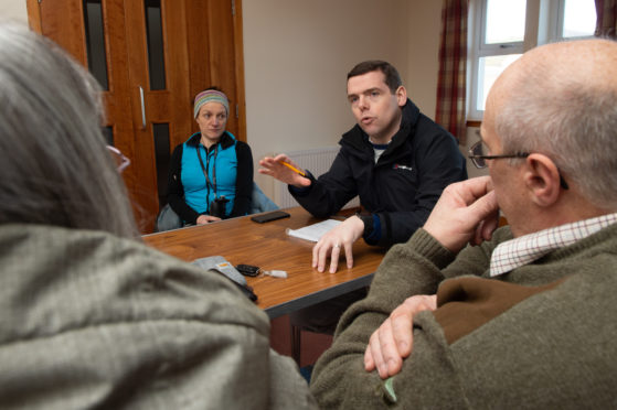Moray MP Douglas Ross meets with community representatives of Dallas and Knockando at the Houldsworth Institute.

Pictures by Jason Hedges