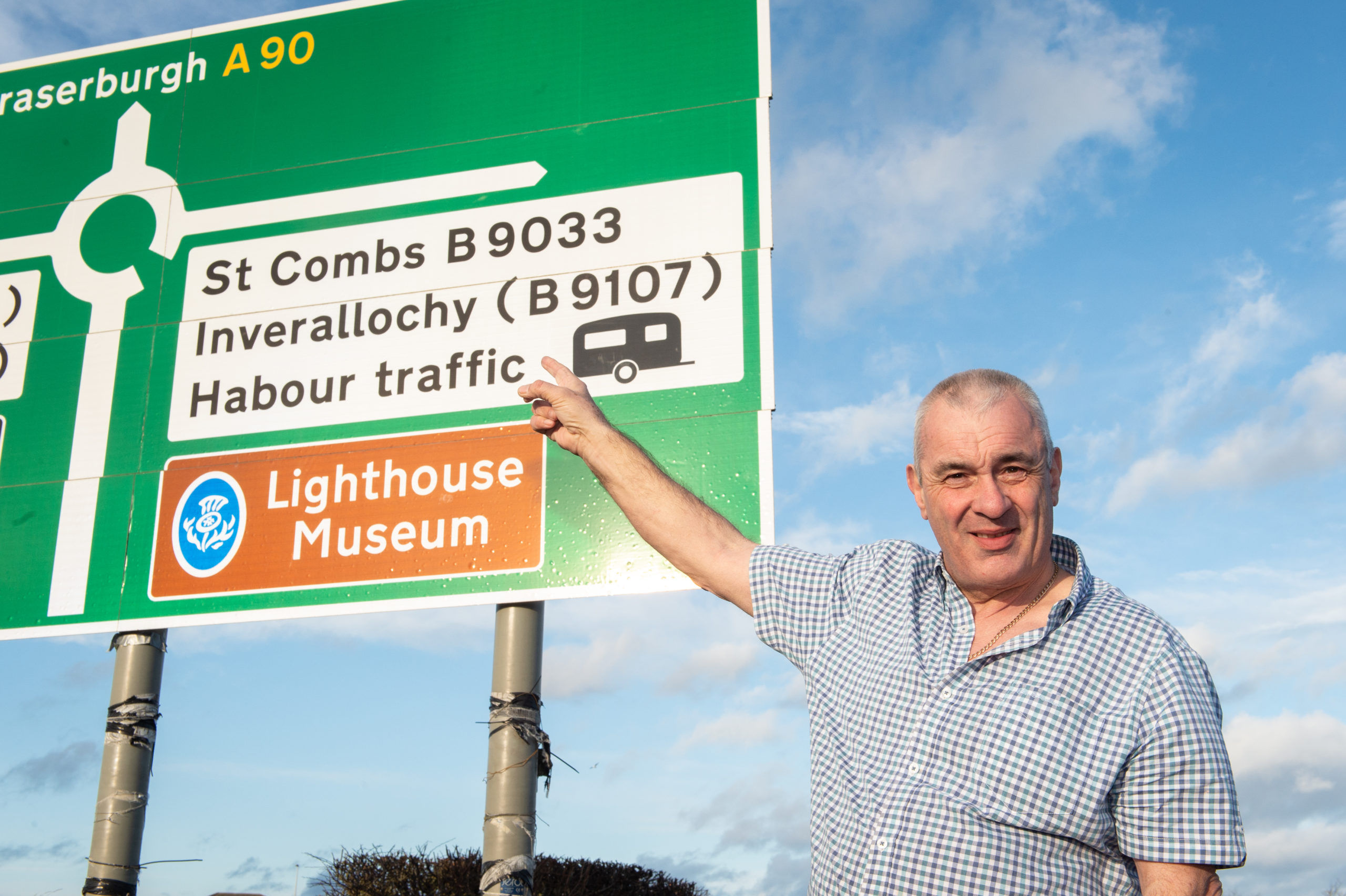 The sign on the entrance to Fraserburgh on the A90 from Peterhead shows the incorrectly spelt word Harbour. Coucillor Brian Topping is pictured with the sign.

Pictures by JASON HEDGES