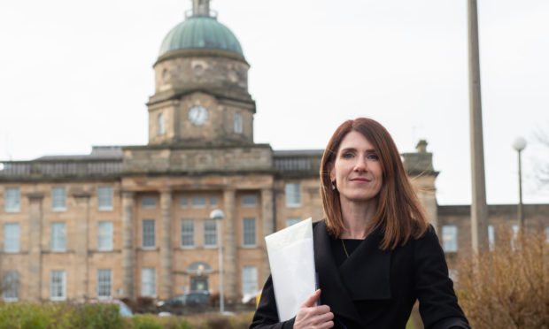 Keep Mum member Kirsty Watson outside Dr Gray's Hospital in Elgin.