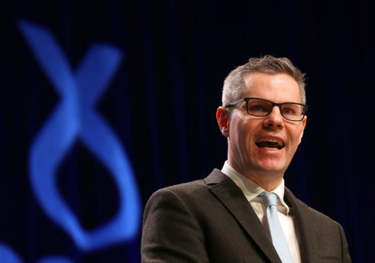 Finance Secretary Derek Mackay speaks during the SNP Spring Conference at the AECC, in Aberdeen.