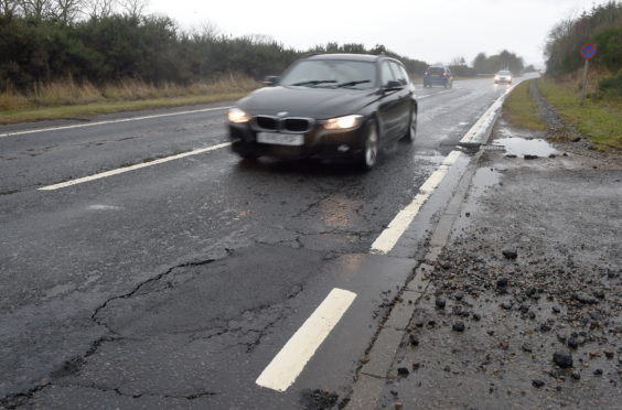 Picture by SANDY McCOOK  14th February '20
The sectiin of the  A9 north of the Storehouse of Foulis following a series of breakdowns on Thursday evening with vehicles being damaged by a large pothole. Fresh tar marks the area of the pothole yesterday morning.(Fri)