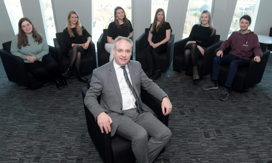 Higher Education Minister Richard Lochhead meeting EU students at Aberdeen University.