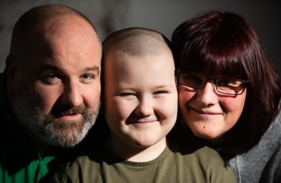 Jimmy Griffin with mum Nicola Turnbull and dad Stuart Griffin.