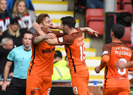 Fraser Fyvie and James Keatings celebrate during their time together at Dundee United.