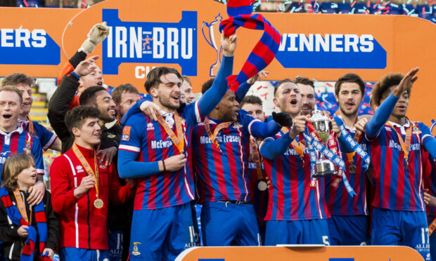 The Caley Thistle side of 2018 lift the Challenge Cup.