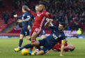 Aberdeen's Funso Ojo in action.