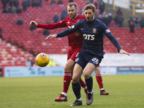 Kilmarnock's Dario Del Fabro and Aberdeen's Niall McGinn, behind.