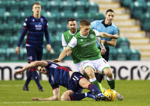 Iain Vigurs in action against Hibernian.