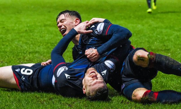 Josh Mullin and Billy Mckay celebrate the latter's equaliser against St Johnstone.