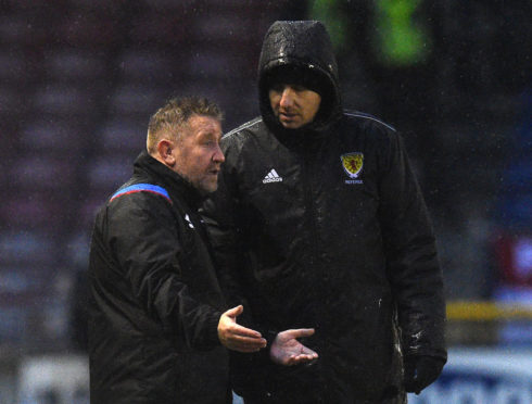 Inverness manager John Robertson appeals James Keatings' red card to fourth official Barry Cook.