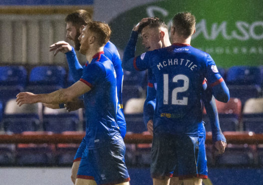 Miles Storey is congratulated after his winning goal.