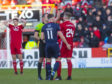 Dean Campbell is sent off by referee Gavin Duncan during the Ladbrokes Premiership match between Aberdeen and Ross County