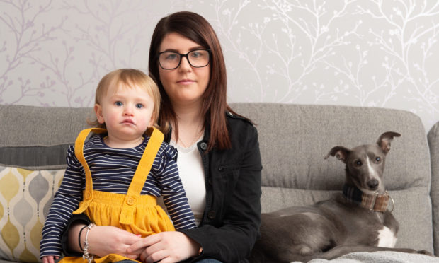 Shelly Ward with daughter Aaliyah Gray and dog Odie. Picture by Jason Hedges. 


Pictures by JASON HEDGES