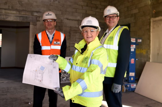 John McHardy, business development director, Robertson's: councillor, Jenny Laing councillor, Douglas Lumsden. 
Picture by Jim Irvine