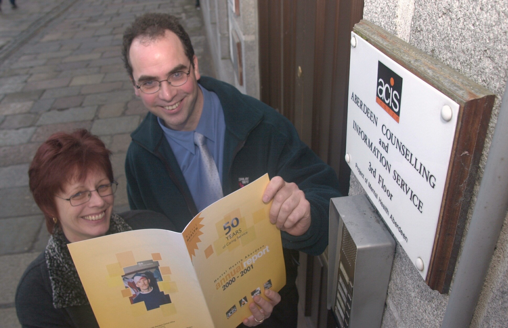 Mental Health Aberdeen's Astrid Whyte outside the Aberdeen Counselling and Information Service office with the 2000-2001 annual report