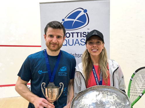 Lisa Aitken, right, with her Scottish Championships trophy.