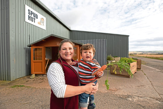 Fiona Smith with her son Mathew outside the Spud Hut.