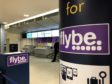 A man standing by a check-in desk at Manchester Airport as Flybe, Europe's biggest regional airline, has collapsed into administration. PA Photo. Picture date: Thursday March 5, 2020. See PA story AIR FlyBe. Photo credit should read: Pat Hurst/PA Wire