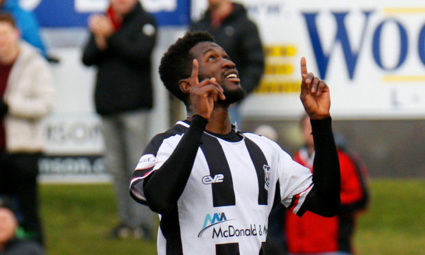 Smart Osadolor celebrates scoring the opening goal of the game for Elgin City.