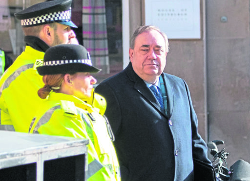 Former Scottish First Minister Alex Salmond arrives at the High Court in Edinburgh on the tenth day of his trial.
