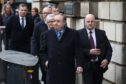 Alex Salmond leaves the High Court in Edinburgh after he was cleared of attempted rape and a series of sexual assaults.